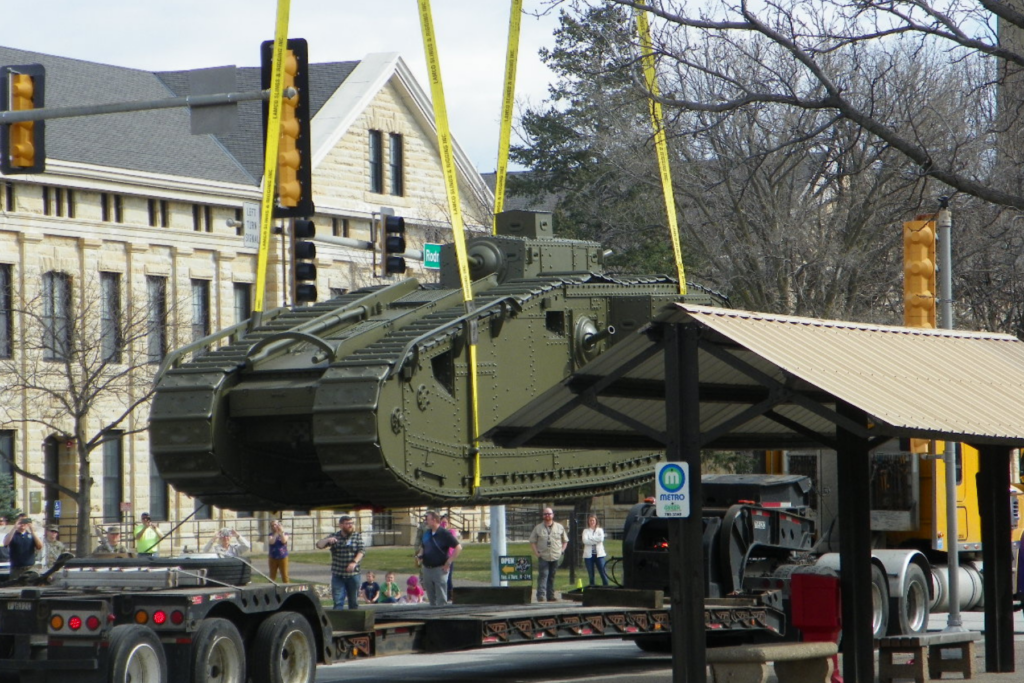 Mark VIII Tank being hoisted by 2 straps - suspending it in the air.